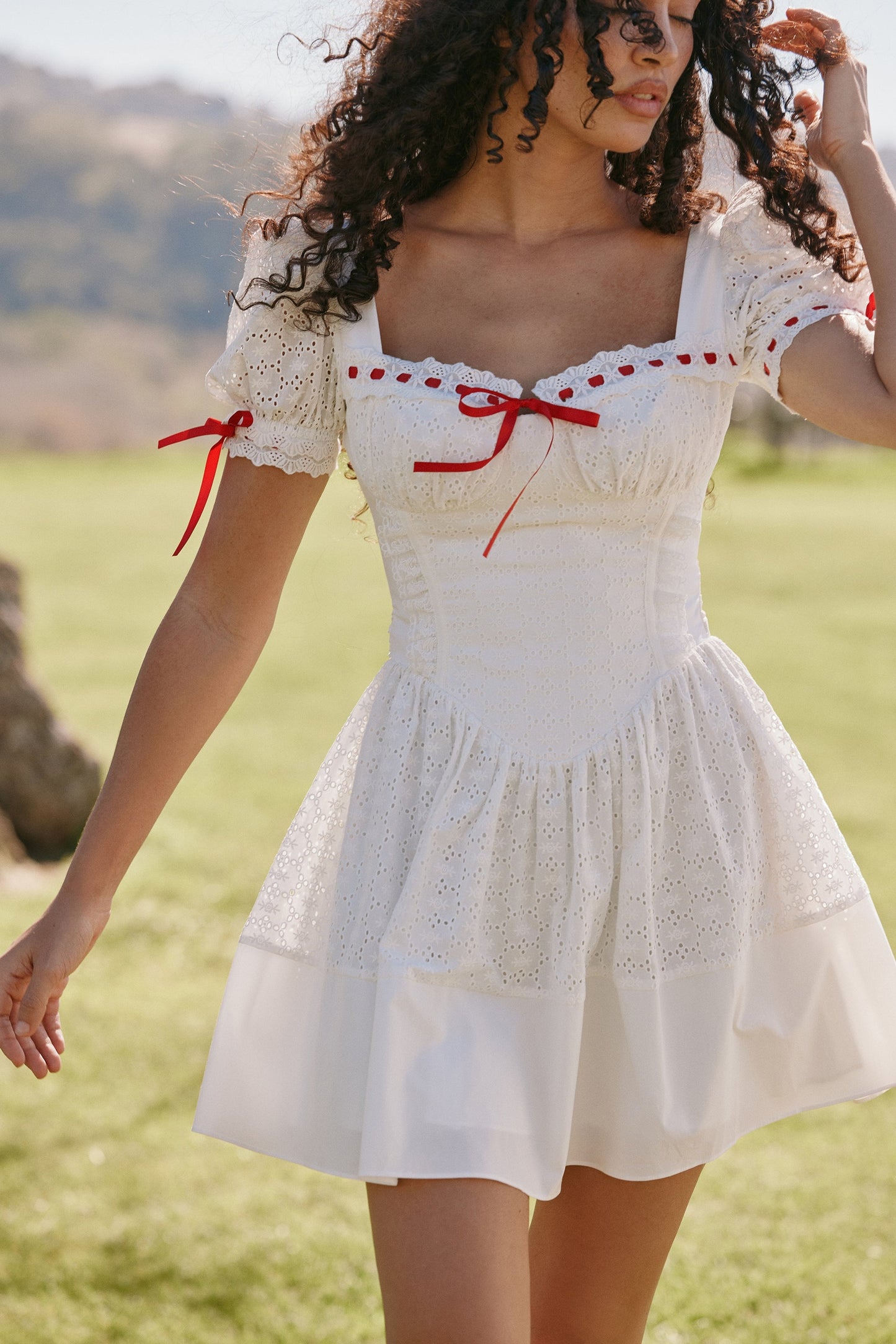 white broderie anglaise puff sleeve mini dress